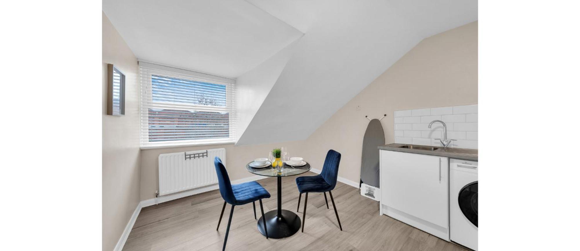Whimsical Nook: Cozy With Separate Kitchen Apartment